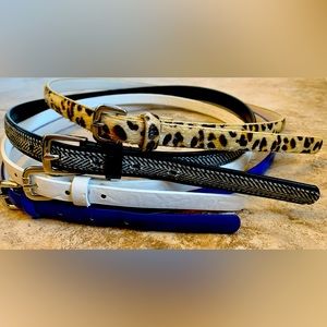 Four fun belts! Selling as a lot.